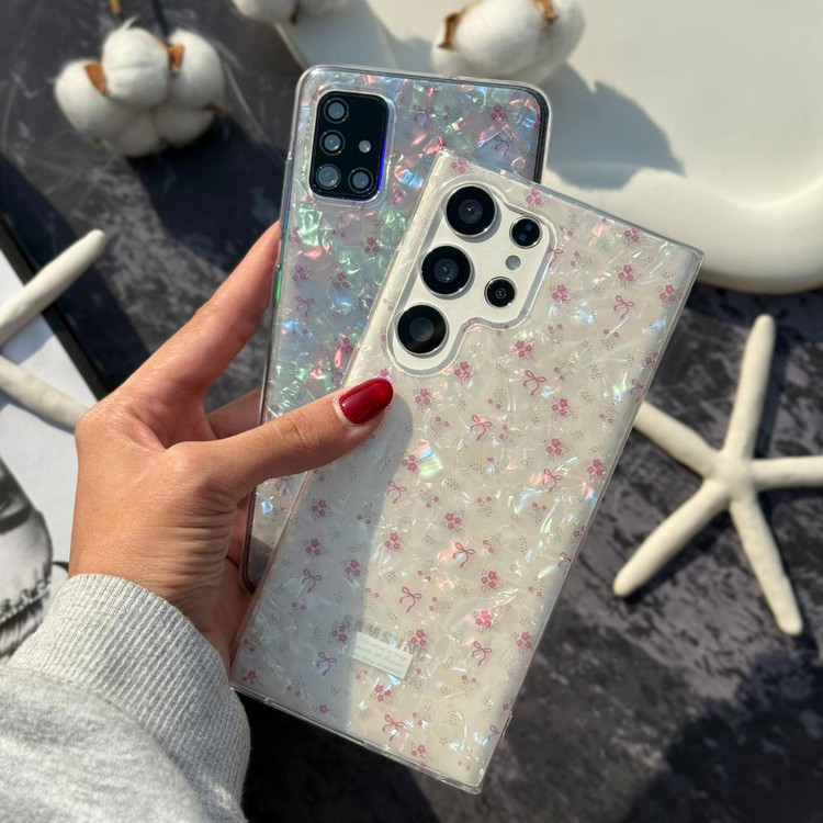 جزئیات پاپیون و گل روی قاب صدفی یخی