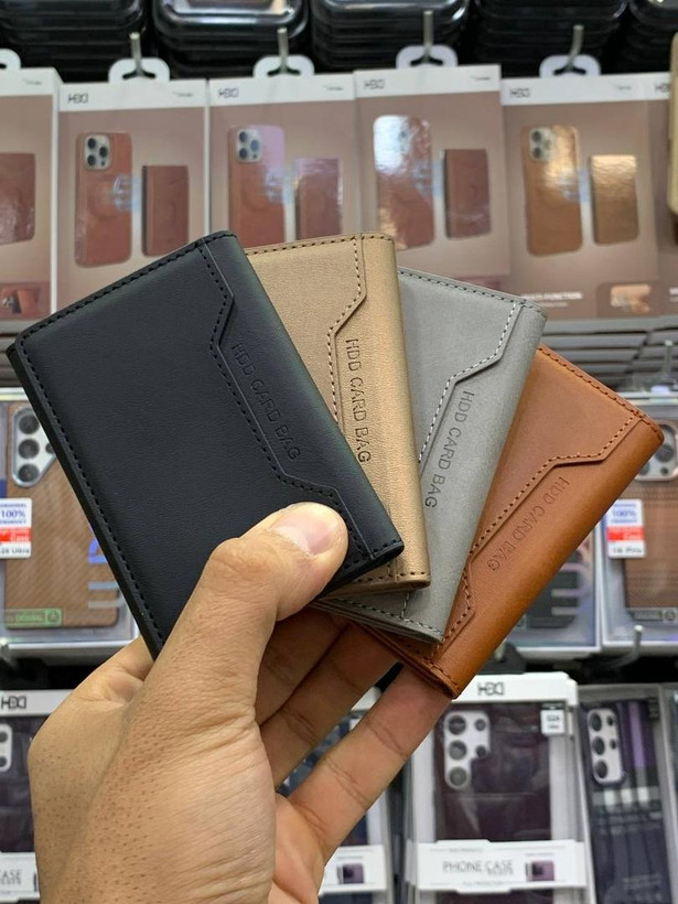 ۶. جاکارتی چرمی HDD Wallt در رنگهای مشکی، گلد، قهوهای و خاکستری