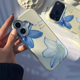 قاب طرح لیلیوم آبی آیفون 12 همراه اکسسوری