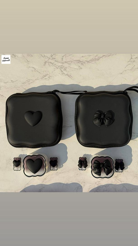 کیف سیلیکونی طرح قلب به همراه محافظ شارژر