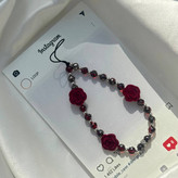 بند آویز گوشی با جزئیات فلزی و سنگی