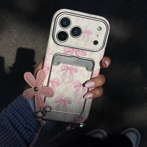 قاب آیفون صورتی با آویز و چارم گل مناسب iPhone 16